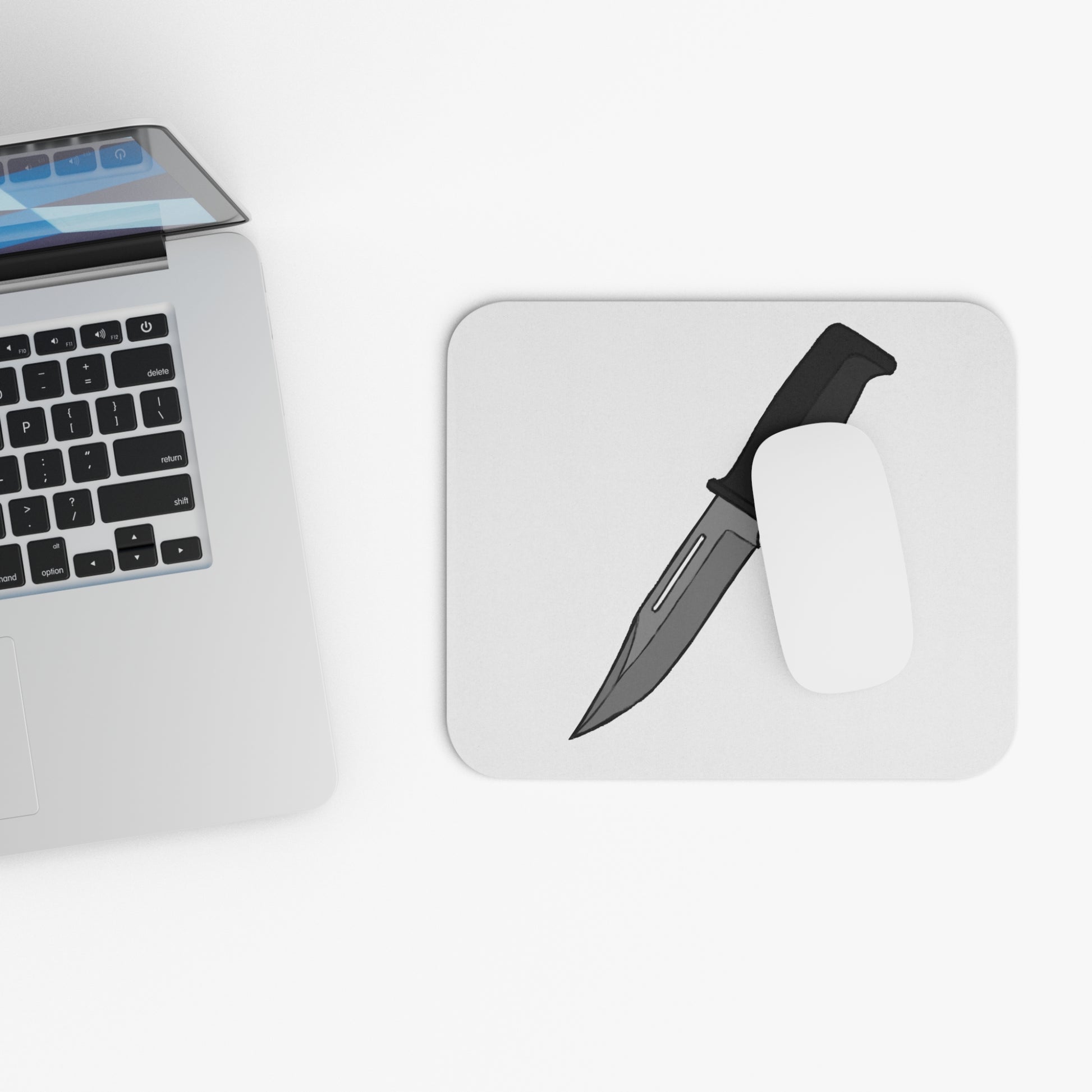 Intruder knife mouse pad